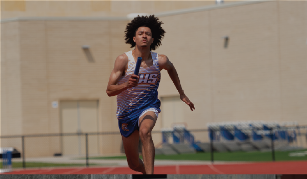 Male Wearing Champion Track Custom Uniform